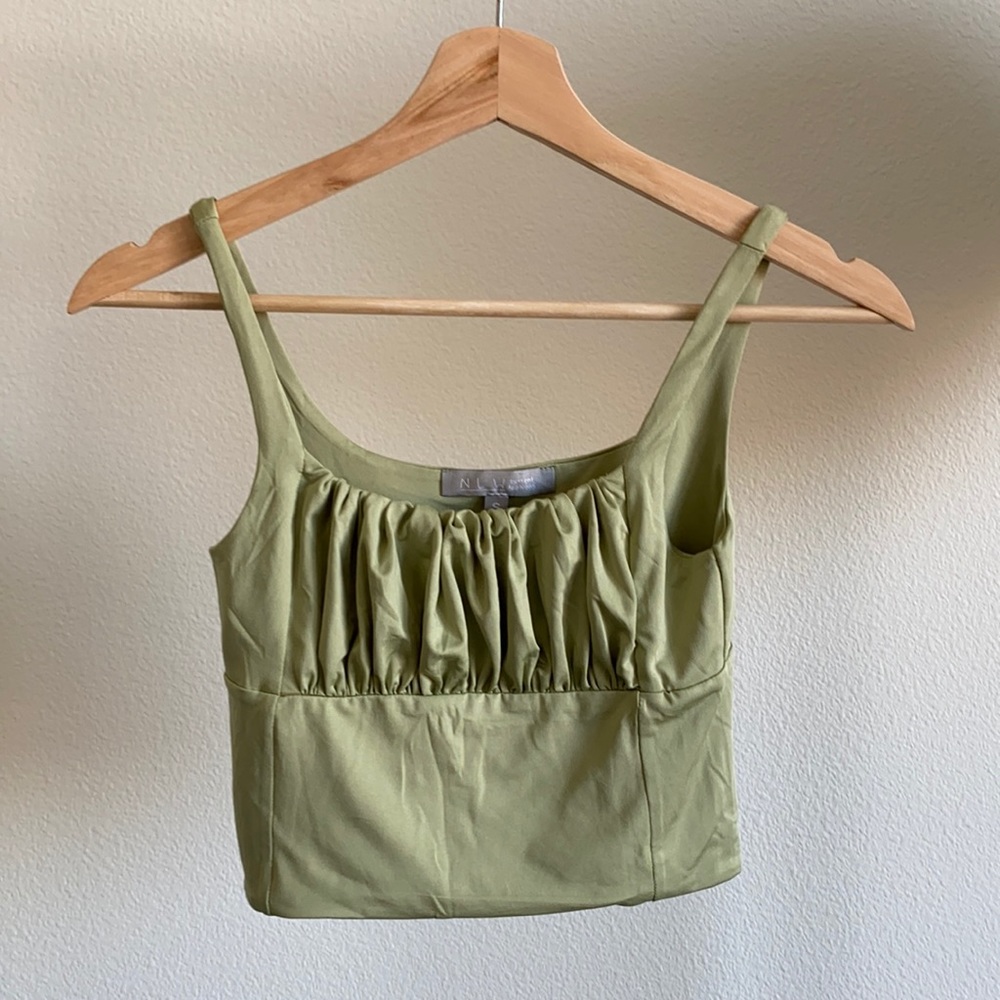 Green ruffle top